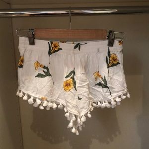 White floral shorts w/ tassel edges
